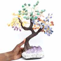 Árbol mineral con base de amatista y hojas de diversos minerales.