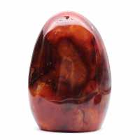 Adorno de cornalina pulida de color naranja rojizo de Madagascar: auténtico ejemplar de colección.