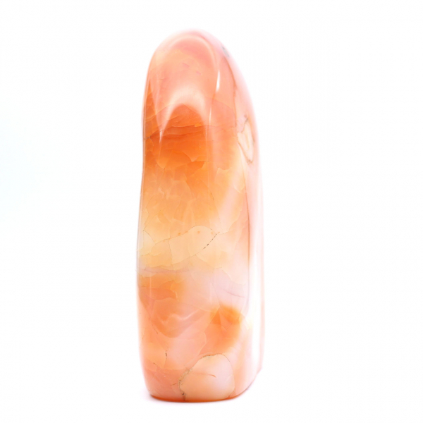 Gran cornalina pulida de Madagascar: mineral rojo anaranjado para colección y decoración.