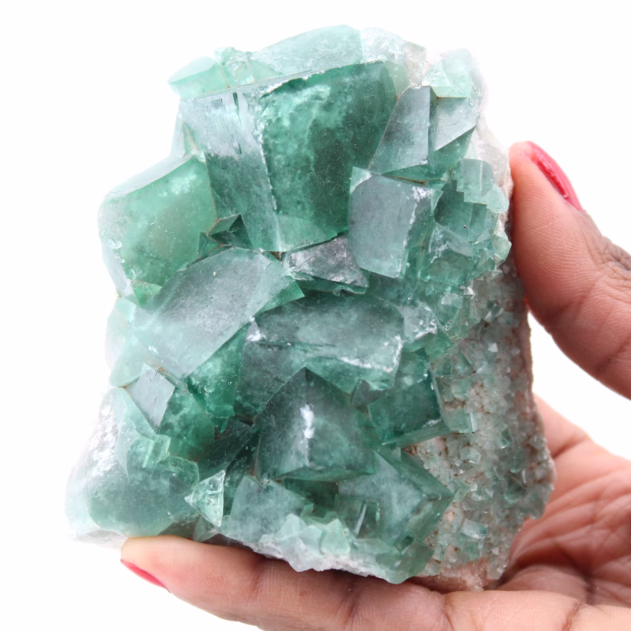 Cristales cúbicos de fluorita verde sobre fluorita masiva