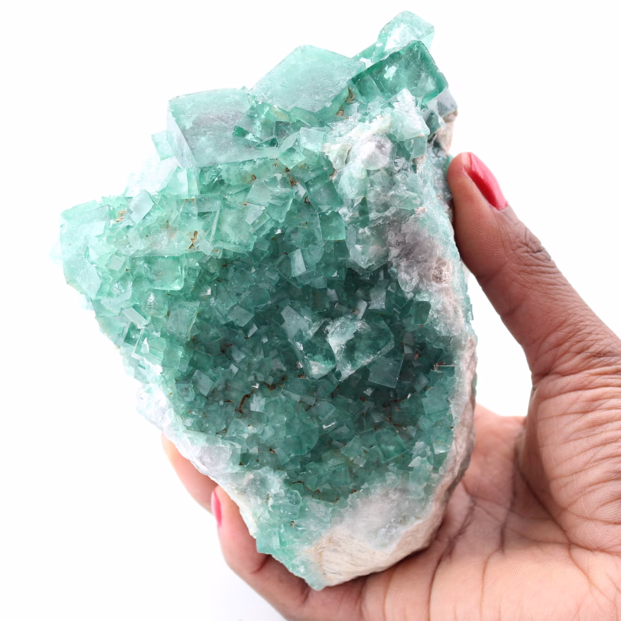 Cristales cúbicos de fluorita verde sobre fluorita masiva