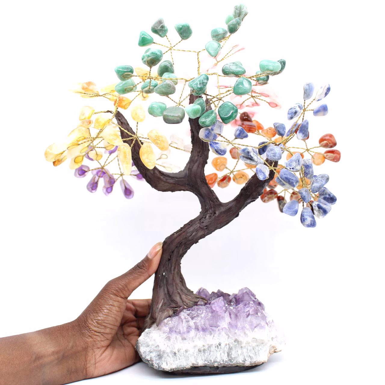 Árbol mineral con base de amatista y hojas de diversos minerales.