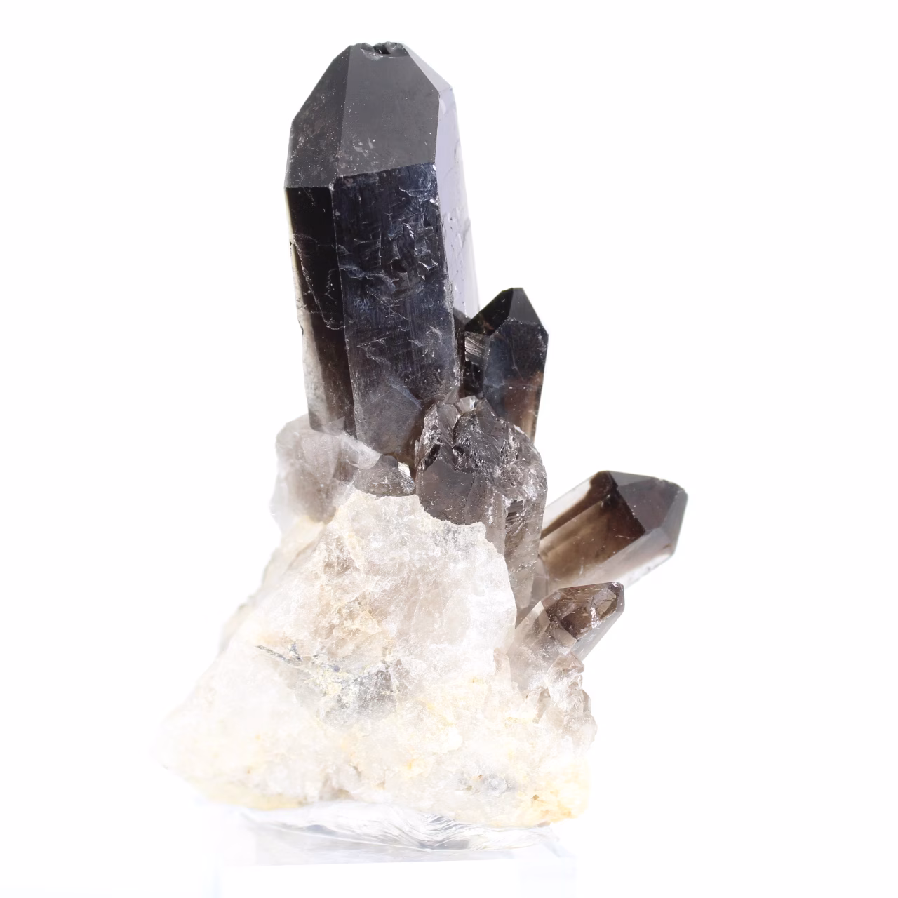 Cristal de cuarzo negro morión, origen Brasil, entregado con peana