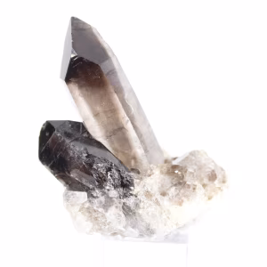 Morión de Brasil, cristal de cuarzo ahumado negro sobre peana de acrílico