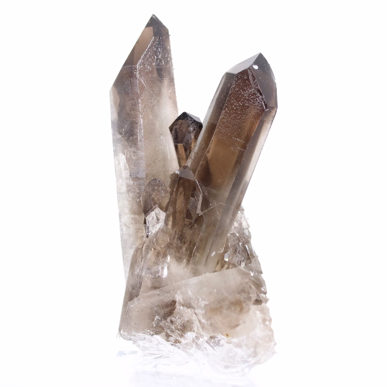 Cristal de cuarzo morión brasileño de porte esbelto, montado sobre peana