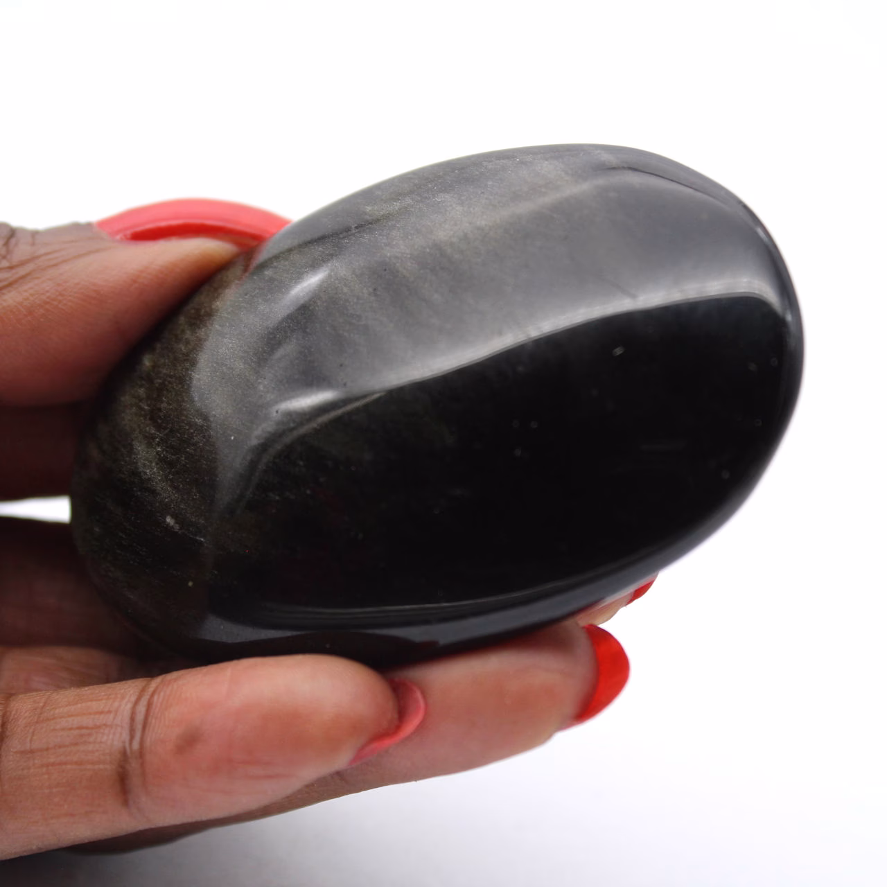 Canto rodado de obsidiana dorada mexicana con superficie pulida, 70 g